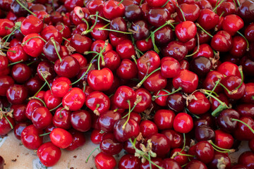 bundle of red cherries in a market
