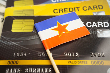 Yugoslavia flag on credit card, finance economy trading shopping online business.