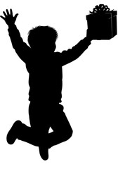 Silhouette of a joyful young boy jumping in the air with a gift box.