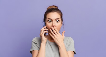 Shocked woman hears surprising news on her phone with a hand over her mouth on a purple background