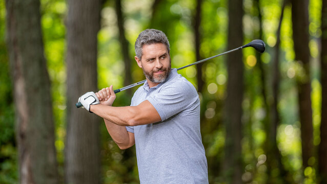 Golf player playing golf in summer. Golfer player with tee on course. Golfer hold golf ball with hand in glove at club. Hand in golf glove. Golfer man hand with glove. Summer activity