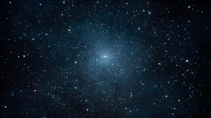 Obraz premium A dense luminous star cluster glows brightly in the deep dark expanse of the night sky