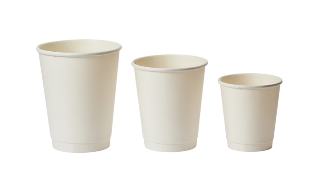 Set of three different sized blank disposable paper coffee cups on transparent background in high angle view for eco friendly packaging design