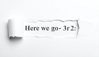 Torn paper revealing text