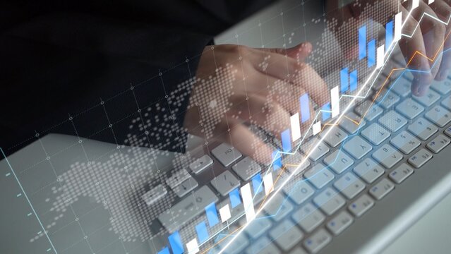 A business professional analyzes digital data trends on a laptop. A financial growth chart overlay enhances the workspace, emphasizing technology and productivity. Copula - Powered by Adobe