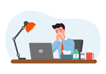 Sick man employee with runny nose and work on laptop. Unhealthy male worker feel sick, busy with online job. Guy use medicine from fever, flu or cold. 