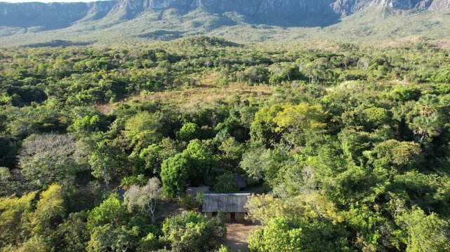drone Guardi&atilde;o waterfall, blue water, sunny day, incredible landscape, in the V&atilde;o do Moleque community in Chapada dos Veadeiros