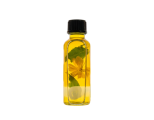Clear bottle with black cap holding golden liquid and botanicals