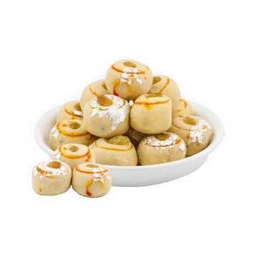 Indian Sweet Kesar Peda with Silver Leaf in Bowl