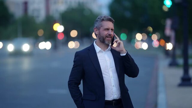 Phone call conversation. Business call. Successful businessman outdoor. Businessman use phone. Mature businessman in suit. Corporate business. Rich Hispanic businessman in suit
