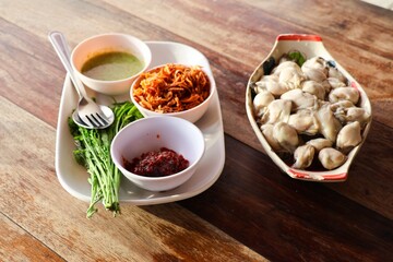 herbs and spices on wooden table