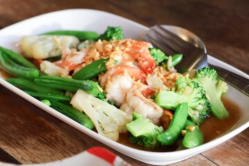 Close-up of stir-fried vegetables with shrimp, a healthy dish.