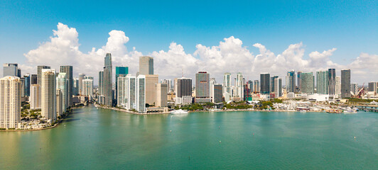 Obraz premium Panorama of Miami Brickell skyline. Panorama cityscape of Brickell Miami. Scenic drone view of Florida coastline. Miami skyline with skyscrapers.