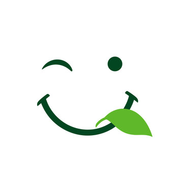 Healthy Food Winking Smile Vector Logo: Green Leaf Licking Lips Icon for Delicious Organic Food, Vegan Restaurant, Tasty Recipe, Diet, Nutrition, and Happy Eating Concept