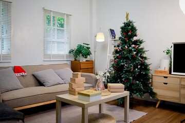 Festive indoor Christmas scene with decorated tree, colorful ornaments, shiny gifts, ribbons, and joyful holiday atmosphere filled with warmth and magic.

