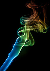 Abstract colorful smoke waves and fiery textures in red, blue, green, and orange shades floating on dark and white backgrounds with copy space for modern artwork