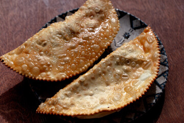 Crispy Chebureki. Traditional Fried Pastry on Plate