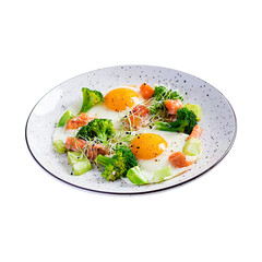 A wholesome breakfast plate featuring sunny side up eggs with fresh broccoli florets and cherry tomatoes