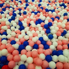 colorful ball pit full of plastic balls