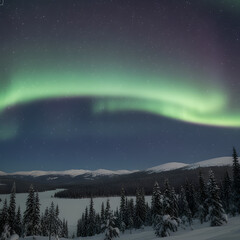Aurora at Mountain Sky in winter