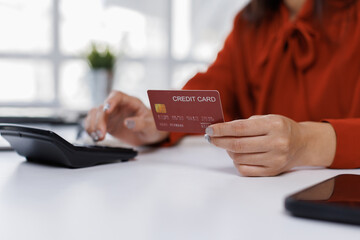 Credit card, laptop and hands of person in home for online shopping, internet purchase and student payment. Ecommerce, fintech and girl on computer for application fee, scholarship or college funding
