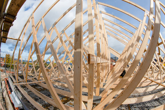 Close-up of construction of roof joists wooden framework on a building site