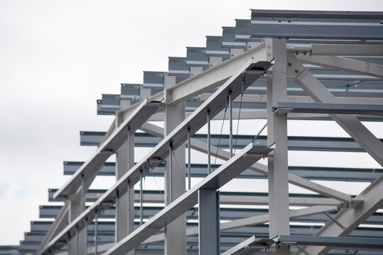 Close-up of construction of modern steel structure framework at building site