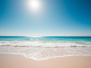 Fototapeta premium Azure sky stretches over a pristine, sun-drenched beach, gentle waves lapping at the shore under a bright, clear sun, clear sky, travel