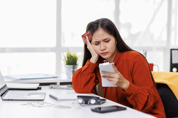 Frustrated desperate millennial woman checking bills for payments, holding receipts, getting upset about overspending, too high mortgage, insurance fees. Homeowner analyzing costs, expenses, budget

