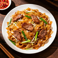 Stir-Fried Beef Rice Noodles with Bean Sprouts and Scallions