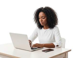 Young african american woman typing on a white laptop computer while sitting at a desk isolated on transparent background