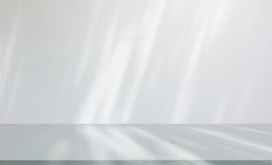 close up mockup studio with shadowing and light of white plain concrete wall texture and tabletop for show product on display background concept