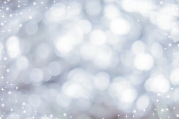 abstract blur white and silver color background with star glittering light for show,promote and advertise product and content in merry christmas and happy new year season collection concept