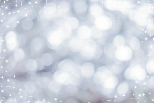 abstract blur white and silver color background with star glittering light for show,promote and advertise product and content in merry christmas and happy new year season collection concept