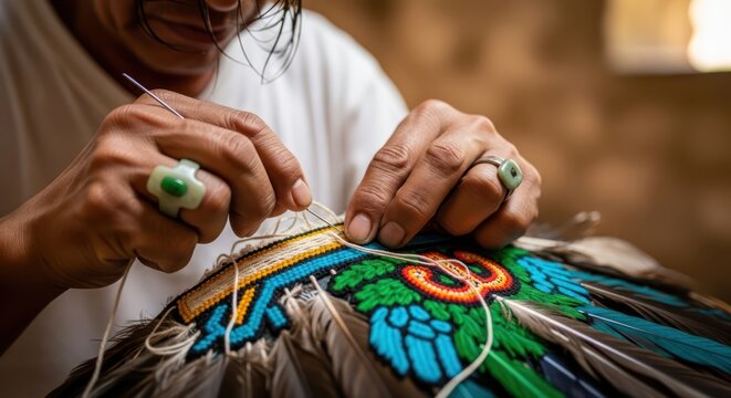 Indigenous artisan meticulously handcrafting a vibrant feathered headdress with precision and care