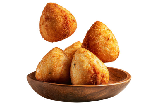Crispy Brazil coxinha snack filled with shredded chicken croquettes and creamy cheese on wooden plate, isolated on white transparent background, concept of South American Cuisine