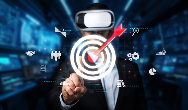 A businessman uses virtual reality technology to enhance marketing strategies, focusing on audience segmentation and research in a dynamic corporate environment. XDMCP