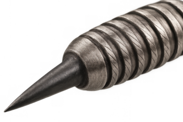 Dart tip focusing on precision and target, embodying concepts of aiming, challenge, and winning in competitive games