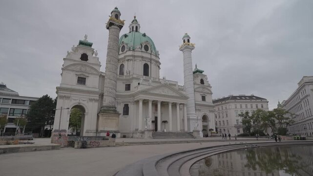 Karlskirche Vienna Exterior and Reflection at Karlsplatz on Cloudy Day Vienna, Austria