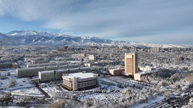 A drone view of the upper part of the Kazakh city of Almaty after a snowfall.
