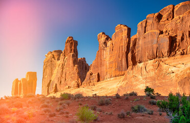 Fototapeta premium Arches National Park in summer season with red sandstone formations and clear blue sky in Utah