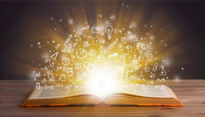 Conceptual image of an open book unleashing a magical explosion of knowledge, ideas, and scientific discovery symbols on a wooden table