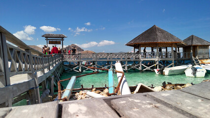 Aerial panoramic view of Pulau Kelor island in Komodo National Park, Indonesia with turquoise sea