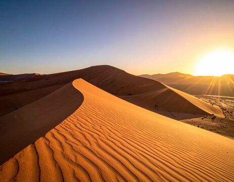 Golden sand dunes at sunset