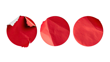 Three red round stickers, one peeled edge