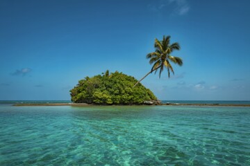 A photograph of a secluded tropical island rising from a vibrant turquoise ocean.