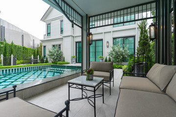 Backyard home patio and swimming pool for leisure lifestyle,