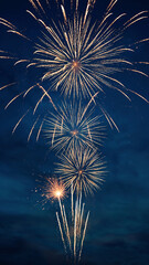 Blue festive background with golden fireworks and sparkling light bursts