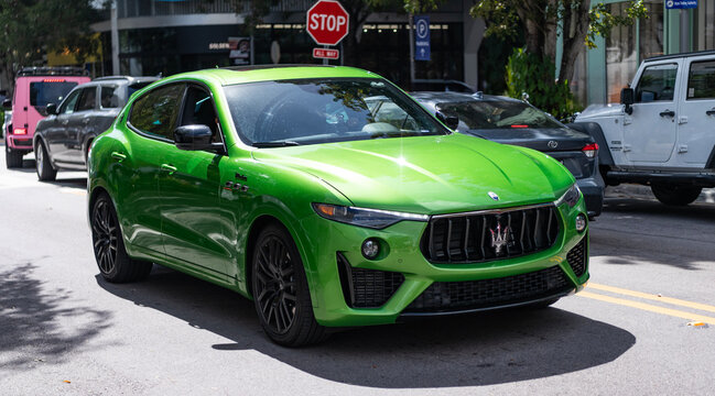 Miami, Florida, USA - February 16, 2025: Maserati Levante Modena S 2023 luxury SUV car. Luxury SUV car Maserati Levante Modena. Car Maserati Levante Modena on the road. Green car, corner view
