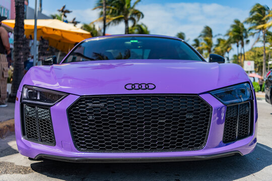 Miami, Florida, USA - April 04, 2025: Sportscar Audi R8. Car Audi R8 supercar parked outdoor. Purple sport car, front view. Audi R8 2017 sportscar supercar car
